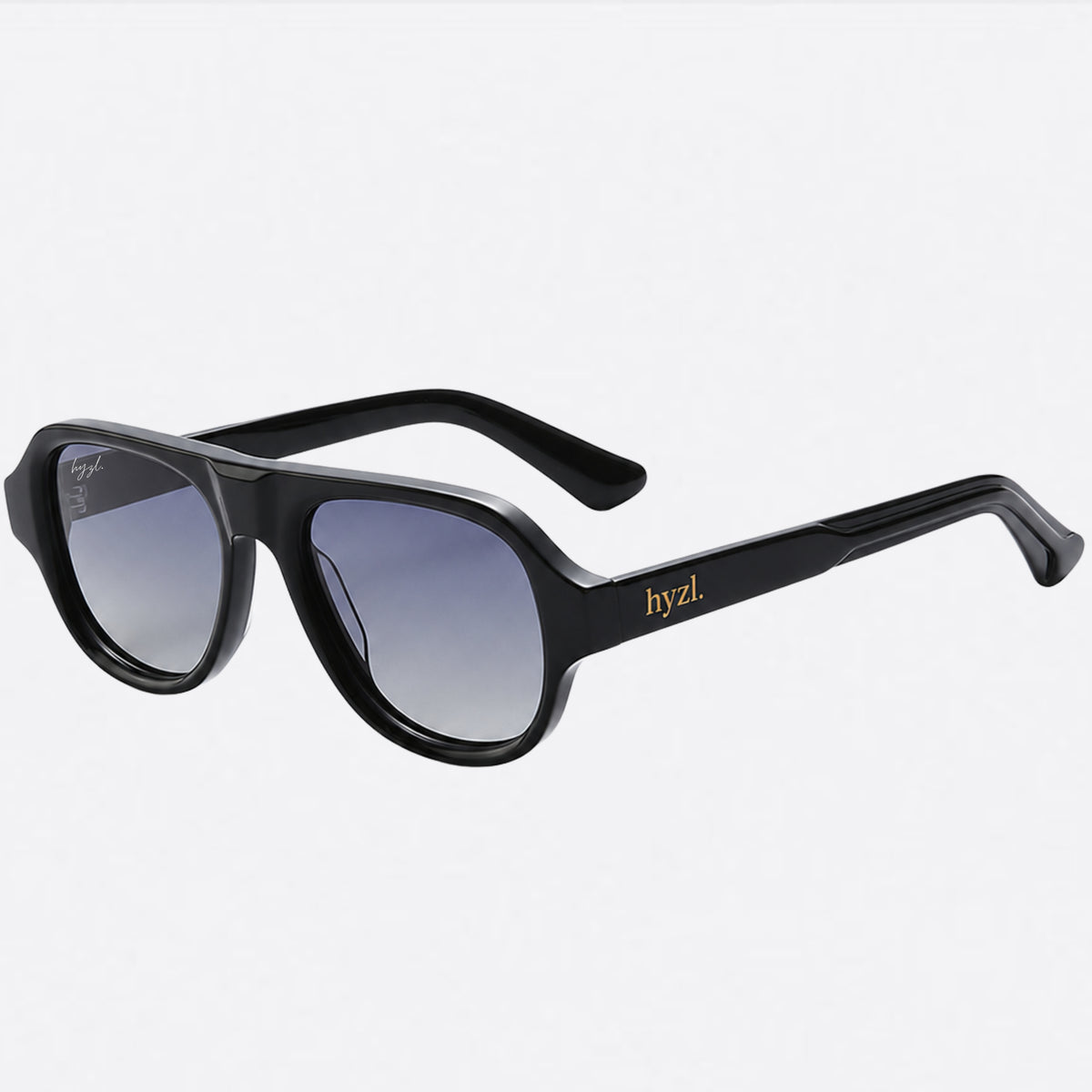Black square aviator-style sunglasses with gradient gray lenses and gold 'hyzl.' branding on the temple, shown on a light gray background.