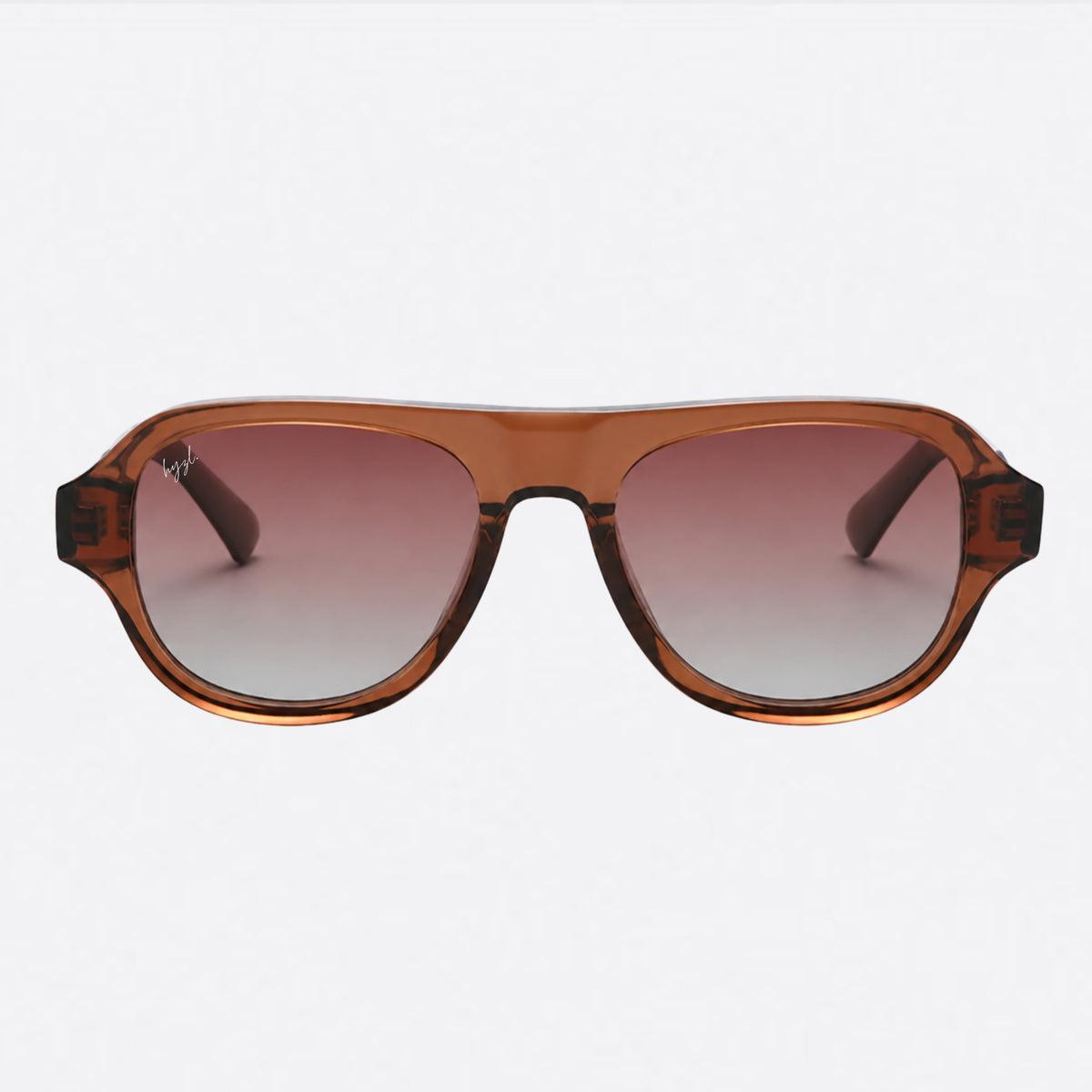 A pair of oversized square sunglasses with a translucent amber-brown acetate frame and gradient brown-to-gray lenses, shown against a plain light gray background.