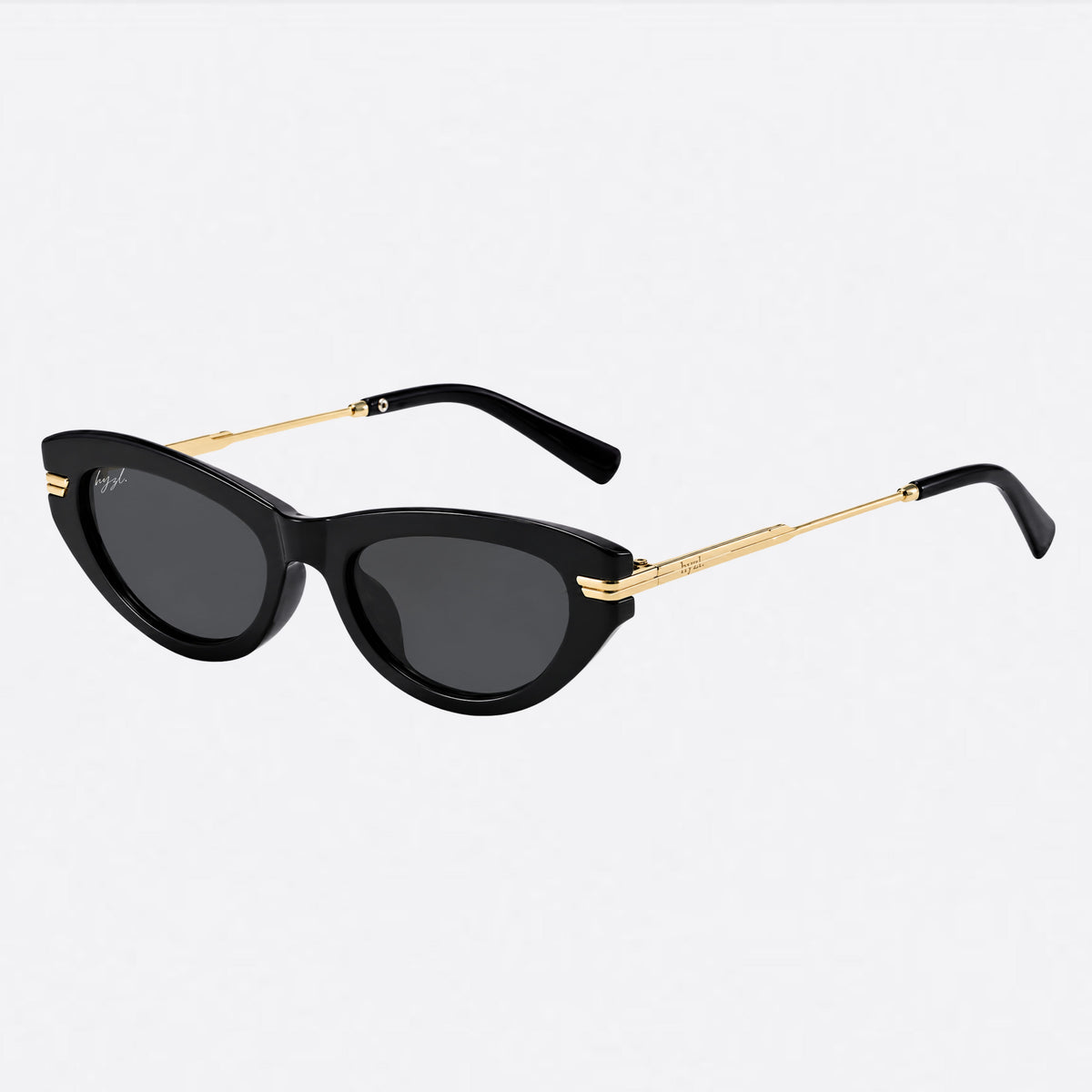 Beige cat-eye sunglasses with dark lenses on a white background
