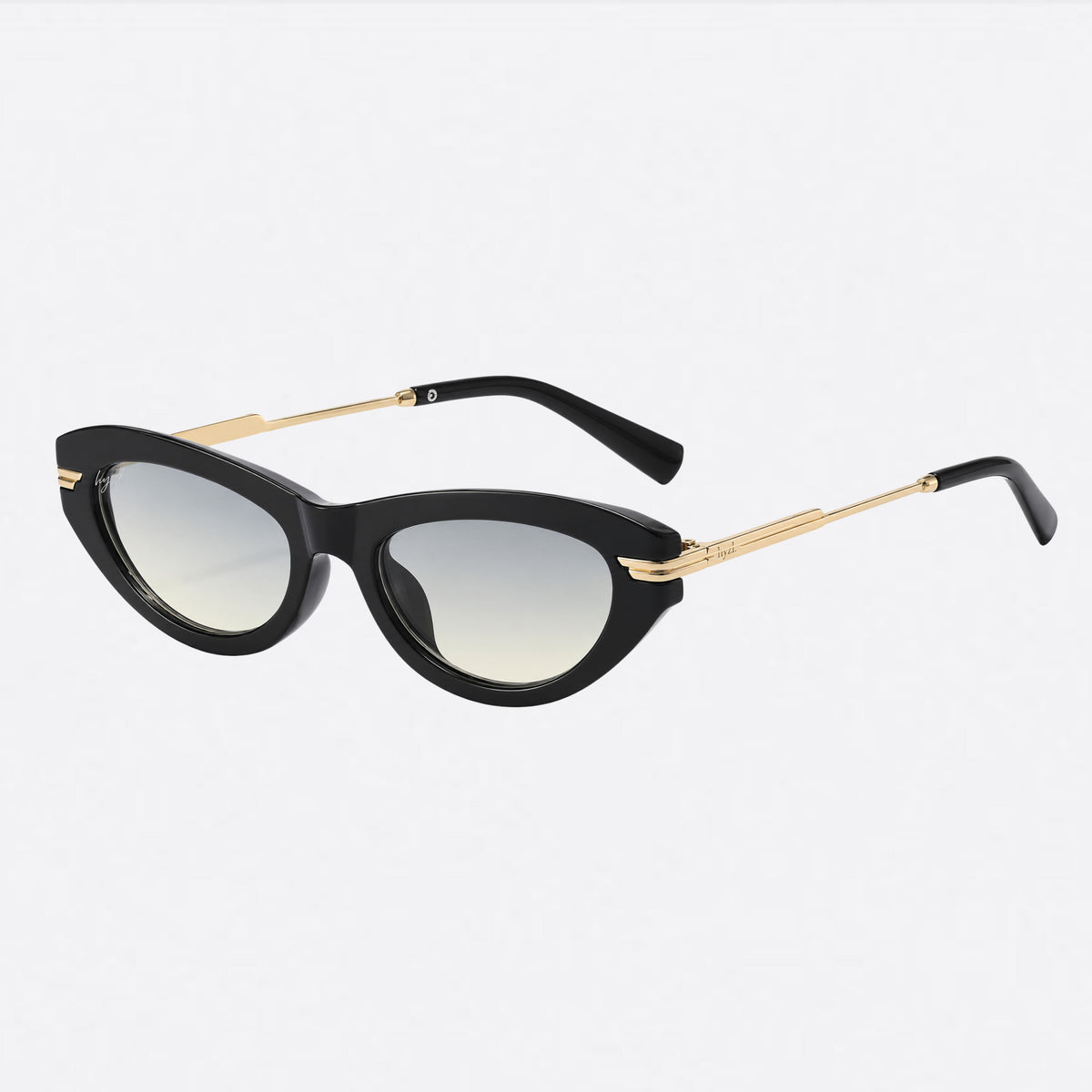 Black cat-eye sunglasses with gold metal bridge and temple accents, featuring gradient tinted lenses, shown on a light gray background.